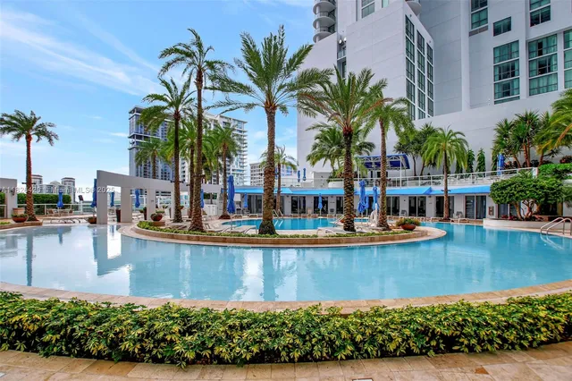 a view of a swimming pool with a patio