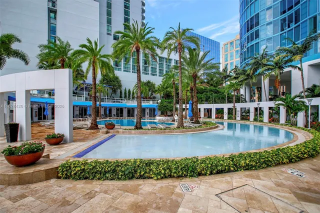 a view of a city with tall buildings