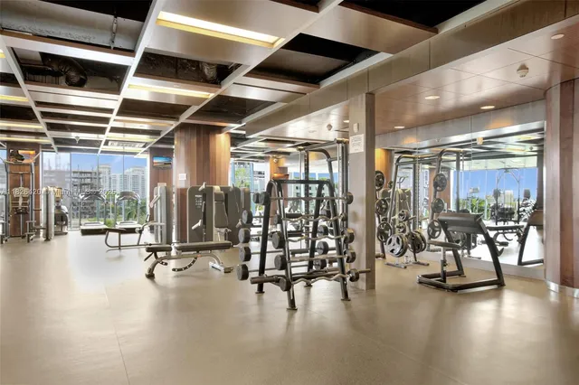 a view of a chairs and table in patio