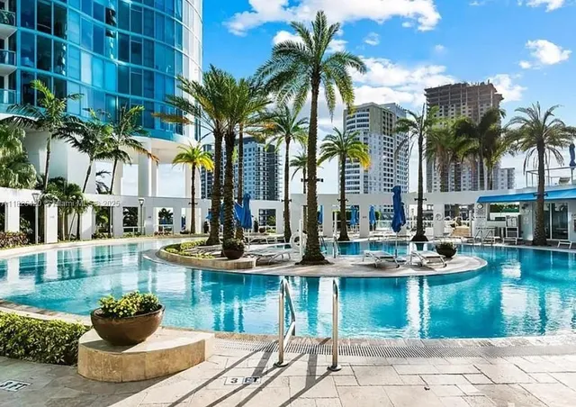 view of house with outdoor space and seating area