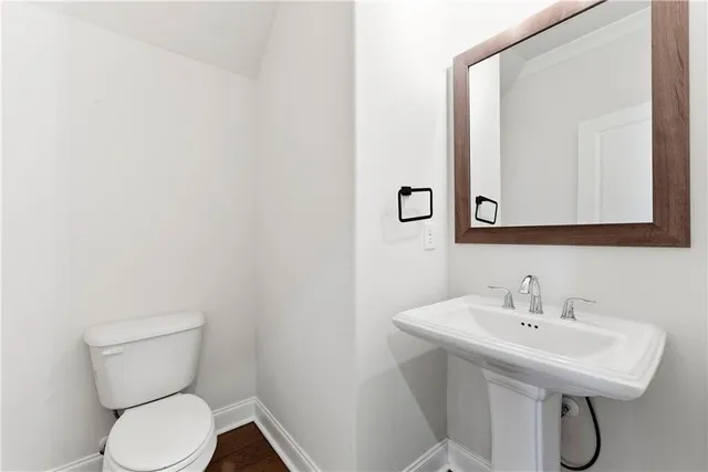 a view of a hallway with a staircase