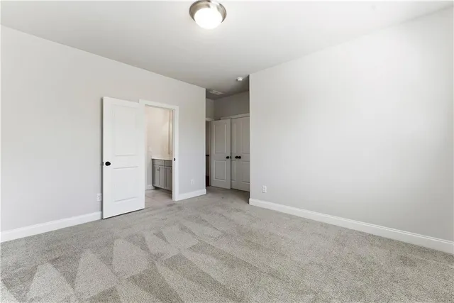 a bathroom with a sink a mirror and a shower