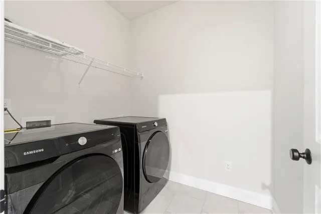 a view of empty room with ceiling fan