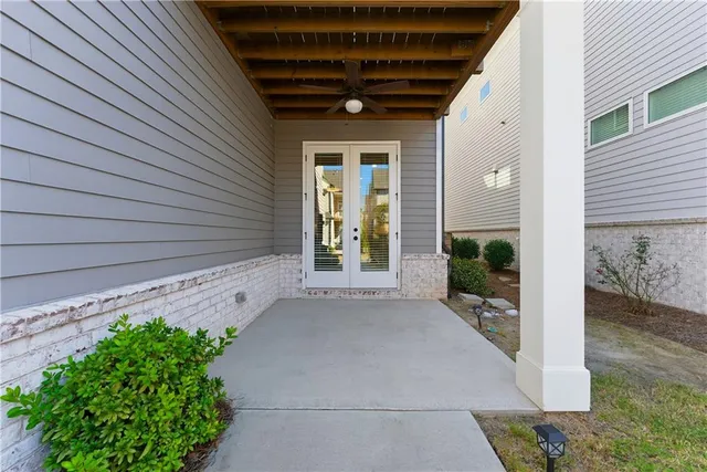 an aerial view of a house with an outdoor space