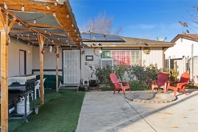 a view of water fountain in front of retail shop