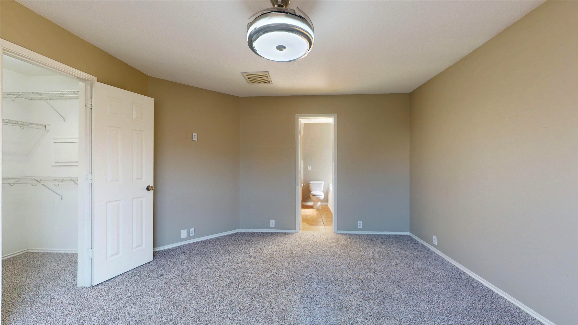 6007 Baldwin Elm Street Richmond, TX 77407 - Photo 20 of 45 a view of a room with rack and ceiling fan
