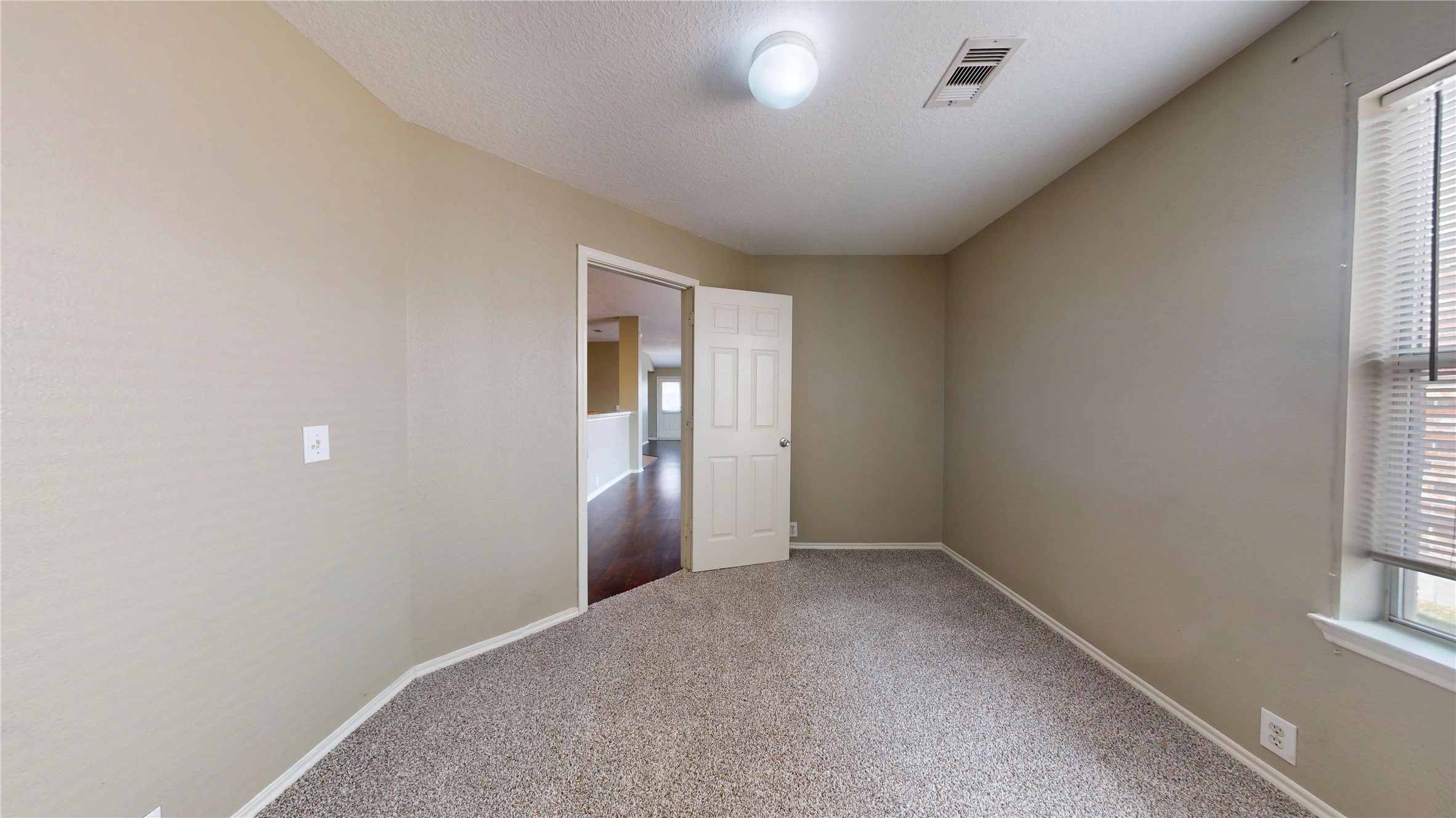 6007 Baldwin Elm Street Richmond, TX 77407 - Photo 29 of 45 an empty room with windows