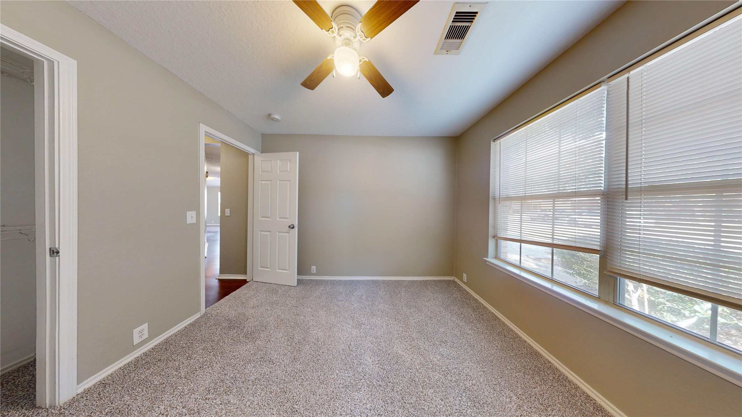 6007 Baldwin Elm Street Richmond, TX 77407 - Photo 32 of 45 a view of an empty room with a window
