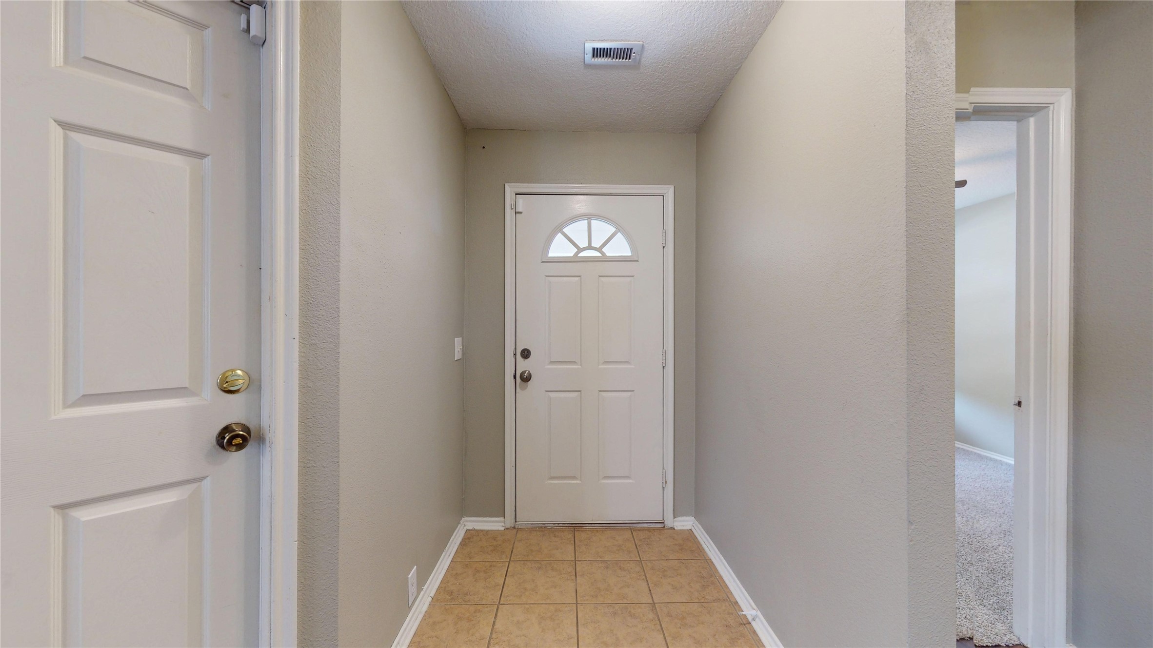 6007 Baldwin Elm Street Richmond, TX 77407 - Photo 4 of 45 a view of an entryway door