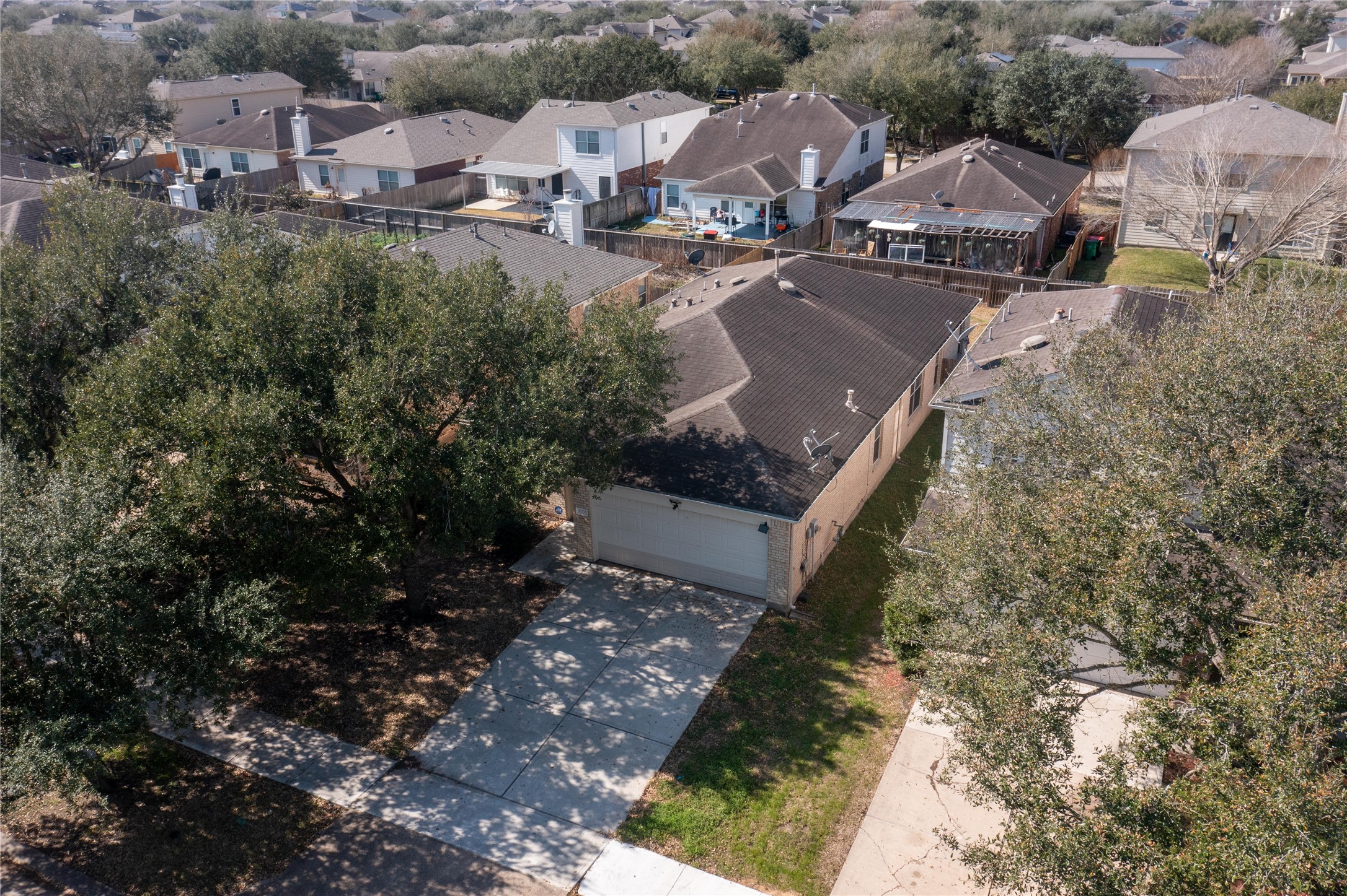 6007 Baldwin Elm Street Richmond, TX 77407 - Photo 44 of 45 a view of multiple houses with yard
