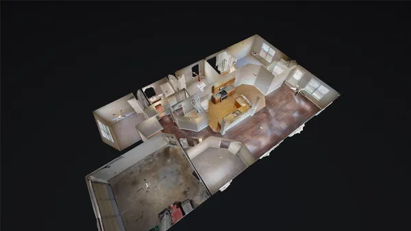 a view of kitchen with windows and refrigerator