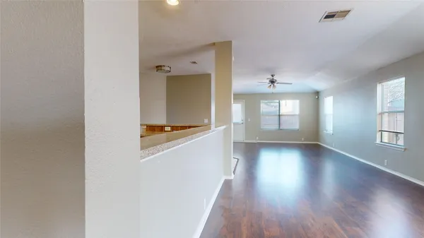 a view of an empty room and window