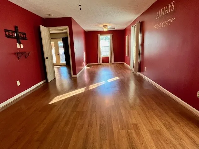 a view of gallery with wooden floor