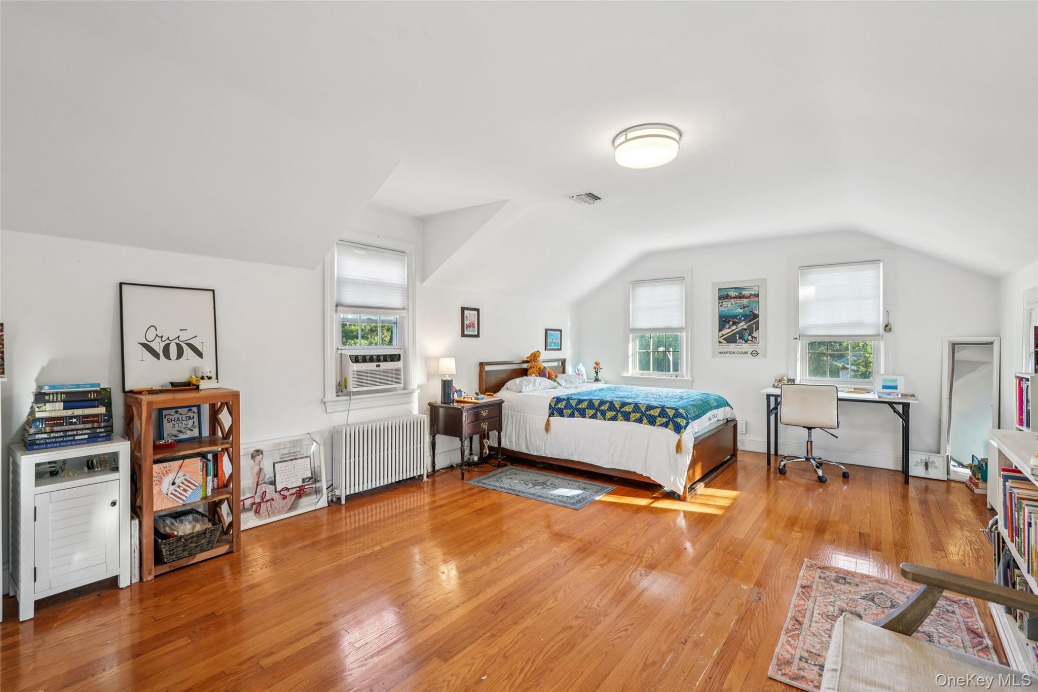8 Abbey Road West Nyack, NY 10994 - Photo 25 of 38 a bedroom with furniture and a wooden floor