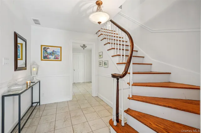 a view of entryway with a front door