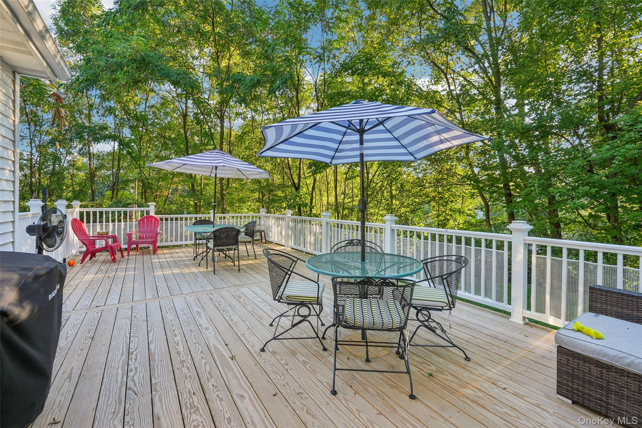 8 Abbey Road West Nyack, NY 10994 - Photo 31 of 38 a view of deck with furniture and barbeque oven with wooden floor