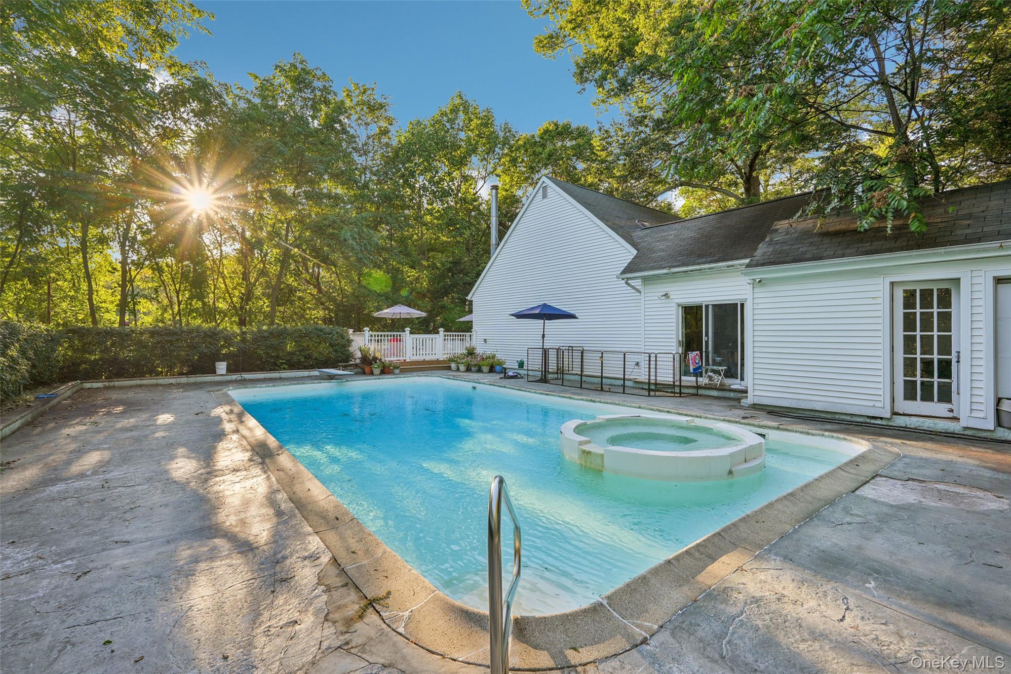 8 Abbey Road West Nyack, NY 10994 - Photo 34 of 38 a view of a house with swimming pool and sitting area