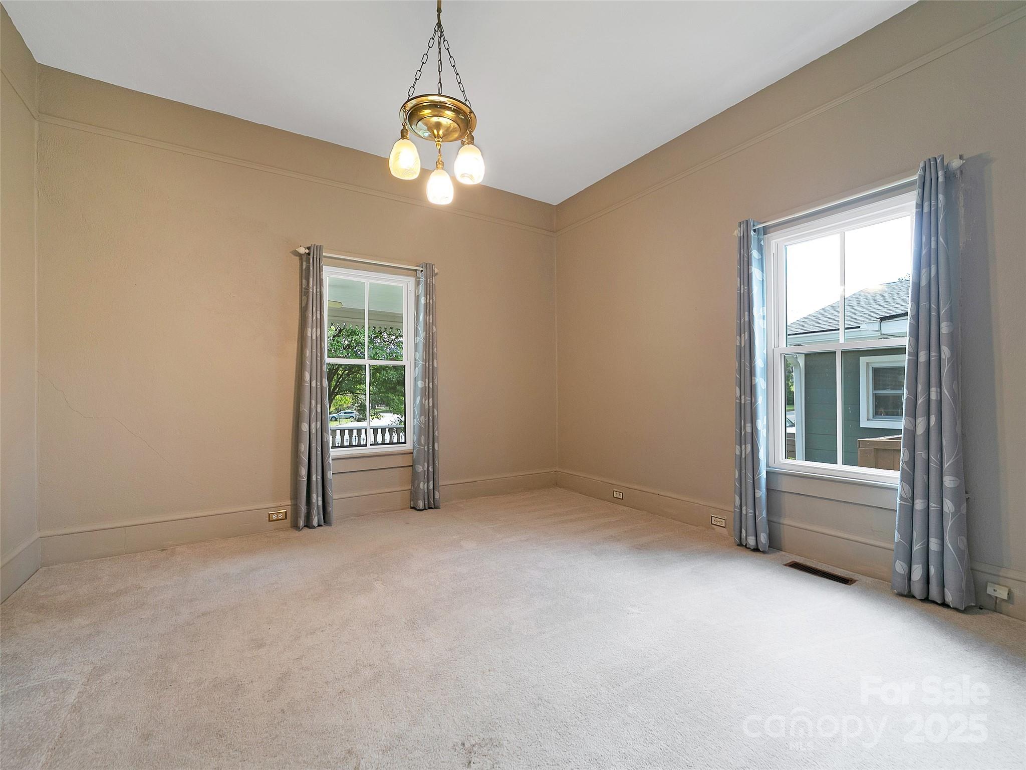 363 North Country Club Road Brevard, NC 28712 - Photo 22 of 42 a view of an empty room with a window