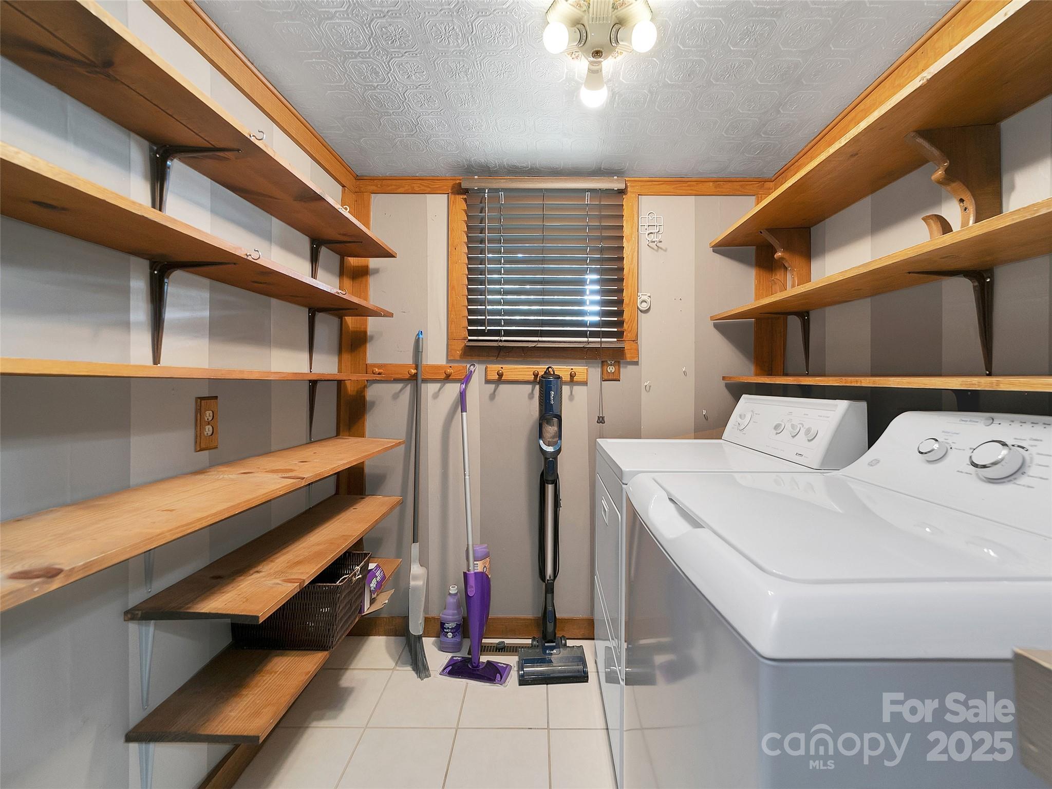 363 North Country Club Road Brevard, NC 28712 - Photo 26 of 42 a view of storage and utility room