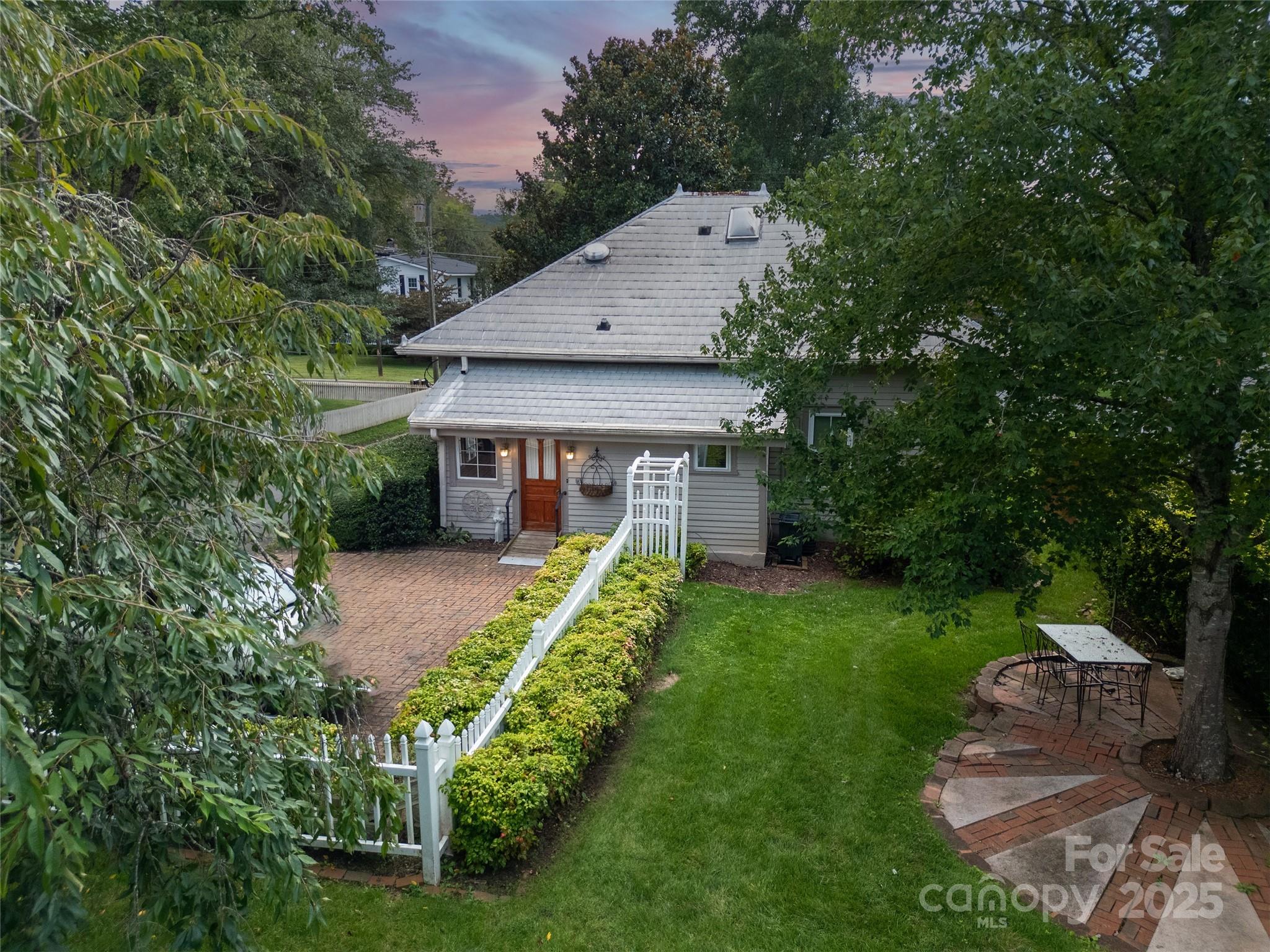 363 North Country Club Road Brevard, NC 28712 - Photo 40 of 42 a view of a house with backyard and sitting area