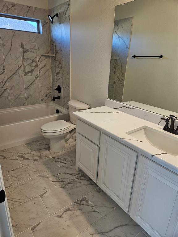 1529 Enloe Road Howe, TX 75459 - Photo 12 of 30 a bathroom with a sink a toilet and shower