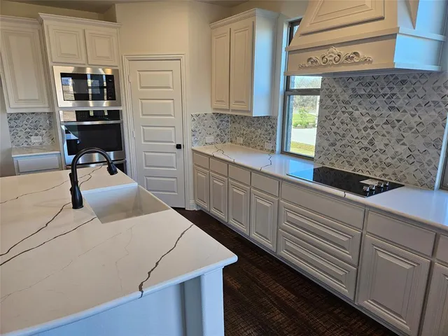 a bedroom with a bed and furniture