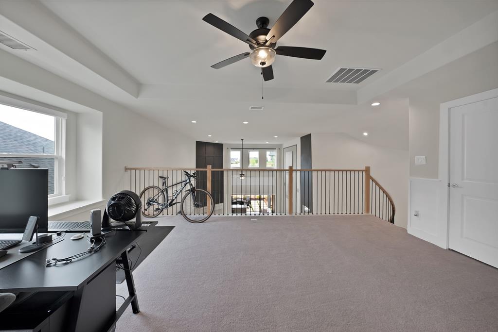 1010 Adair Road Prosper, TX 75078 - Photo 21 of 39 a view of a room with gym equipment
