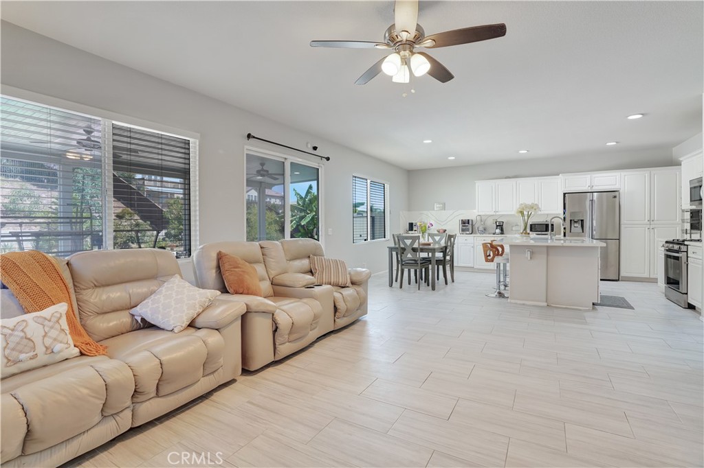 12179 Dewar Drive Riverside, CA 92505 - Photo 13 of 53 a living room with furniture and kitchen view
