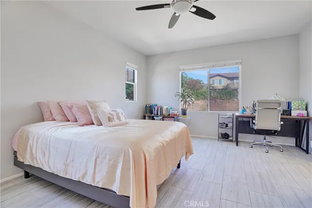 a bed room with a bed and furniture