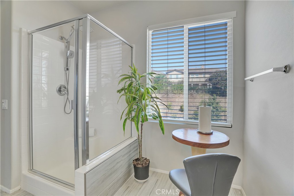 12179 Dewar Drive Riverside, CA 92505 - Photo 19 of 53 a bathroom with a shower