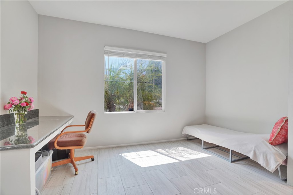 12179 Dewar Drive Riverside, CA 92505 - Photo 29 of 53 a living room with furniture and a window