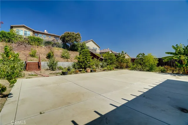 a building with potted plants in front of it