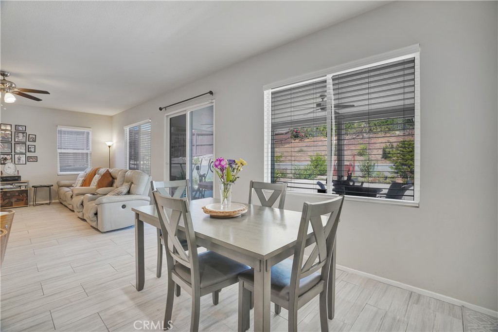 12179 Dewar Drive Riverside, CA 92505 - Photo 6 of 53 a view of a dining room with furniture window and outside view