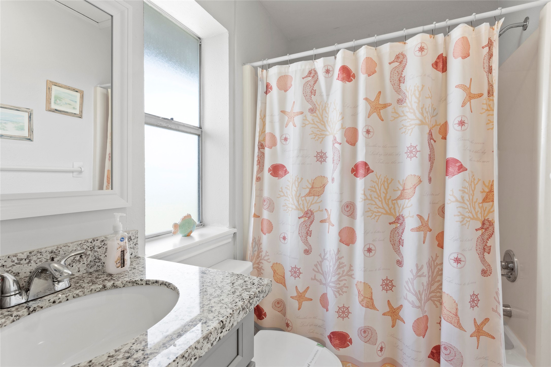 17627 Termini-San Luis Pass Road Galveston, TX 77554 - Photo 9 of 28 Bright and inviting top-floor full bathroom with modern finishes.