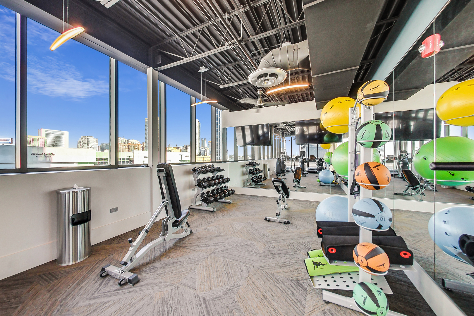 650 West Wayman Street, Unit 503C Chicago, IL 60661 - Photo 20 of 23 a room with gym equipment and window