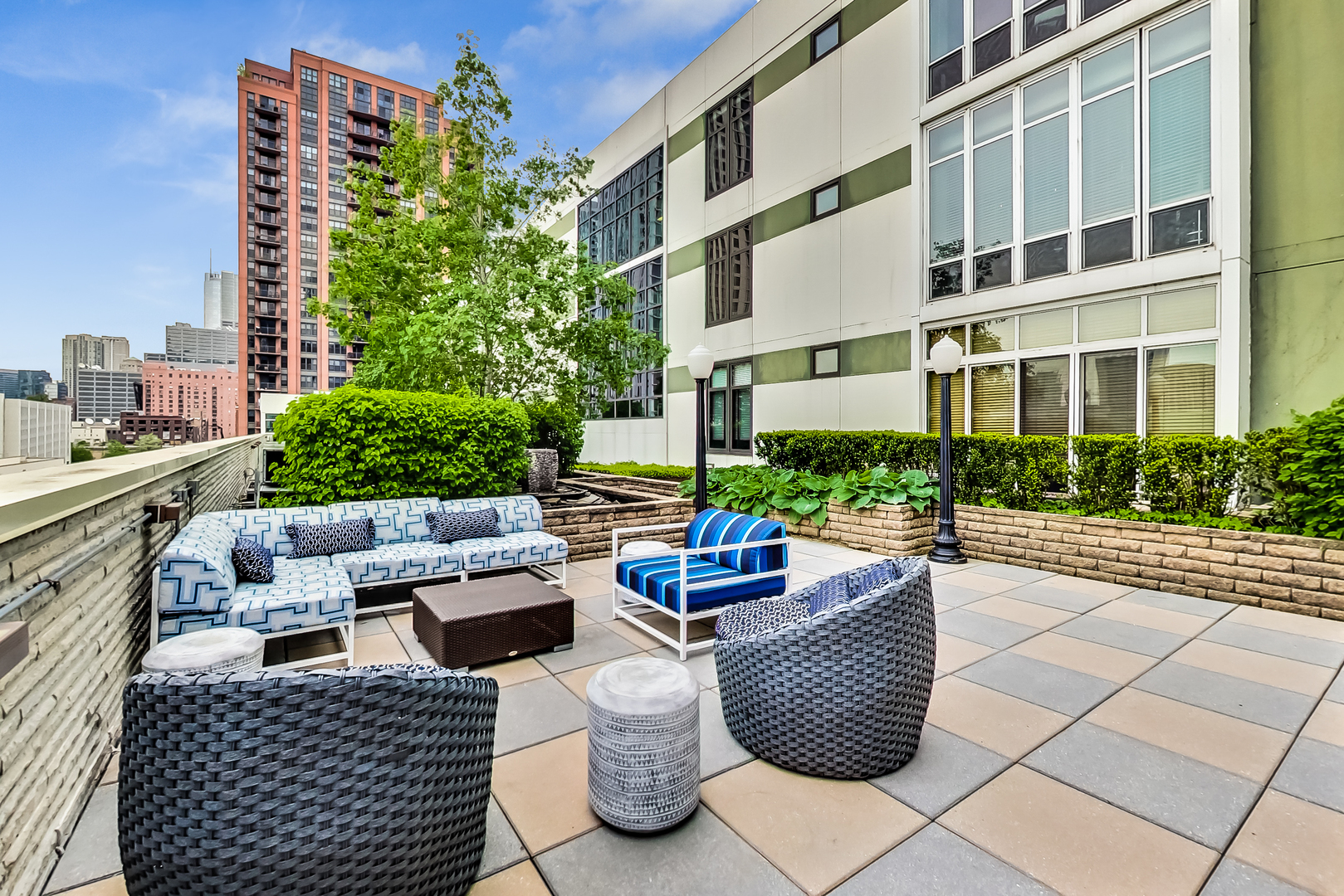 650 West Wayman Street, Unit 503C Chicago, IL 60661 - Photo 22 of 23 a view of a patio with couches and potted plants