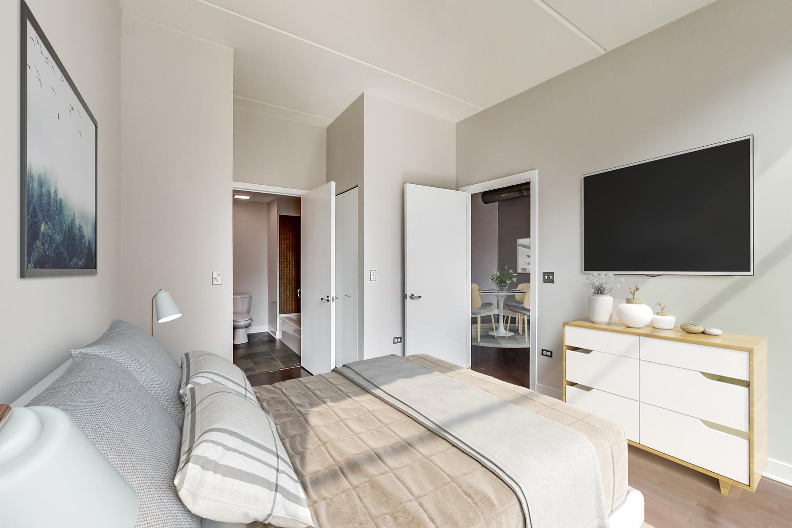 650 West Wayman Street, Unit 503C Chicago, IL 60661 - Photo 8 of 23 a bedroom with a bed and a flat tv screen on wall