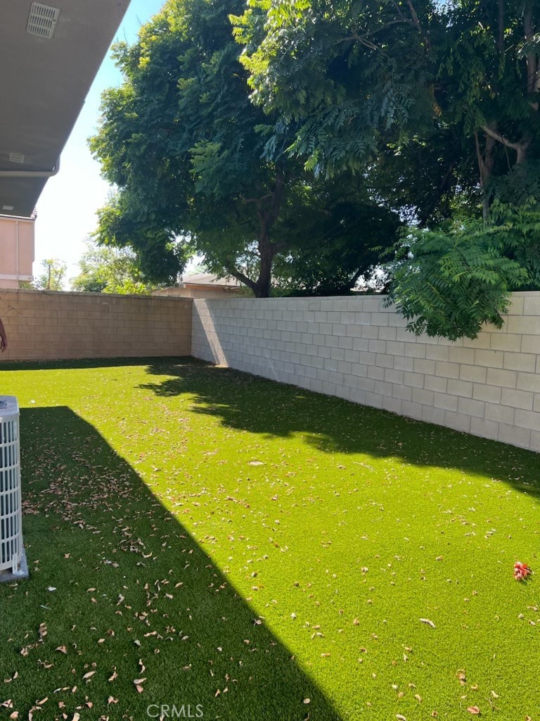 4855 Grace Avenue Cypress, CA 90630 - Photo 15 of 15 a view of a swimming pool with an outdoor space and seating area
