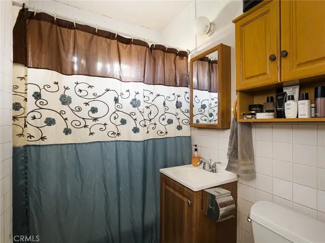 a kitchen with a cabinets and appliances