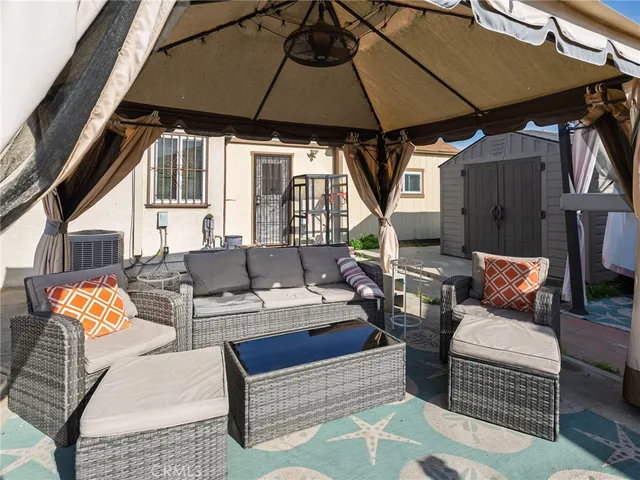 a view of a lounge chairs in the patio