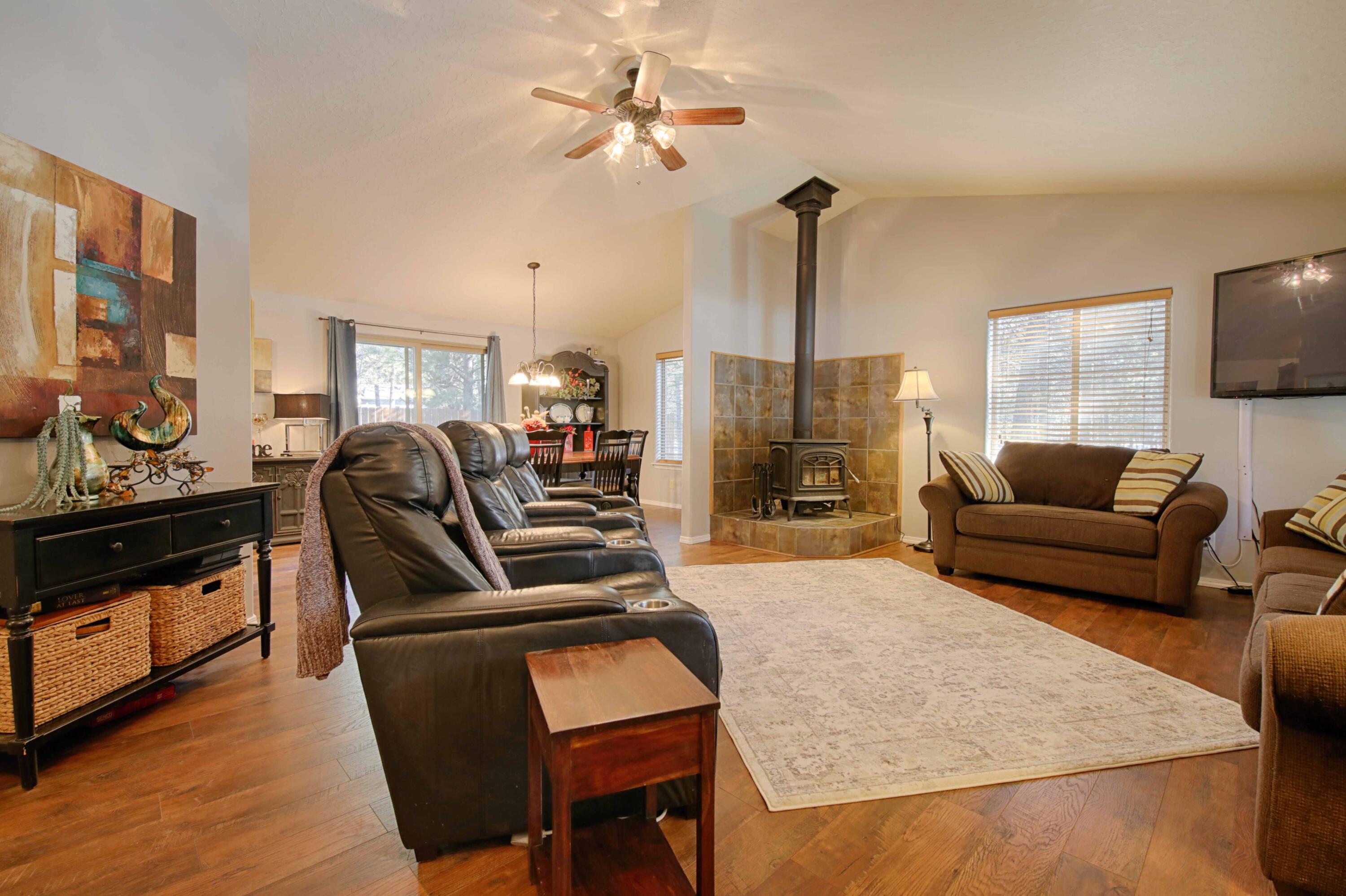 15900 Old Mill Road La Pine, OR 97739 - Photo 2 of 18 Living area with wood stove. New flooring throughout home.