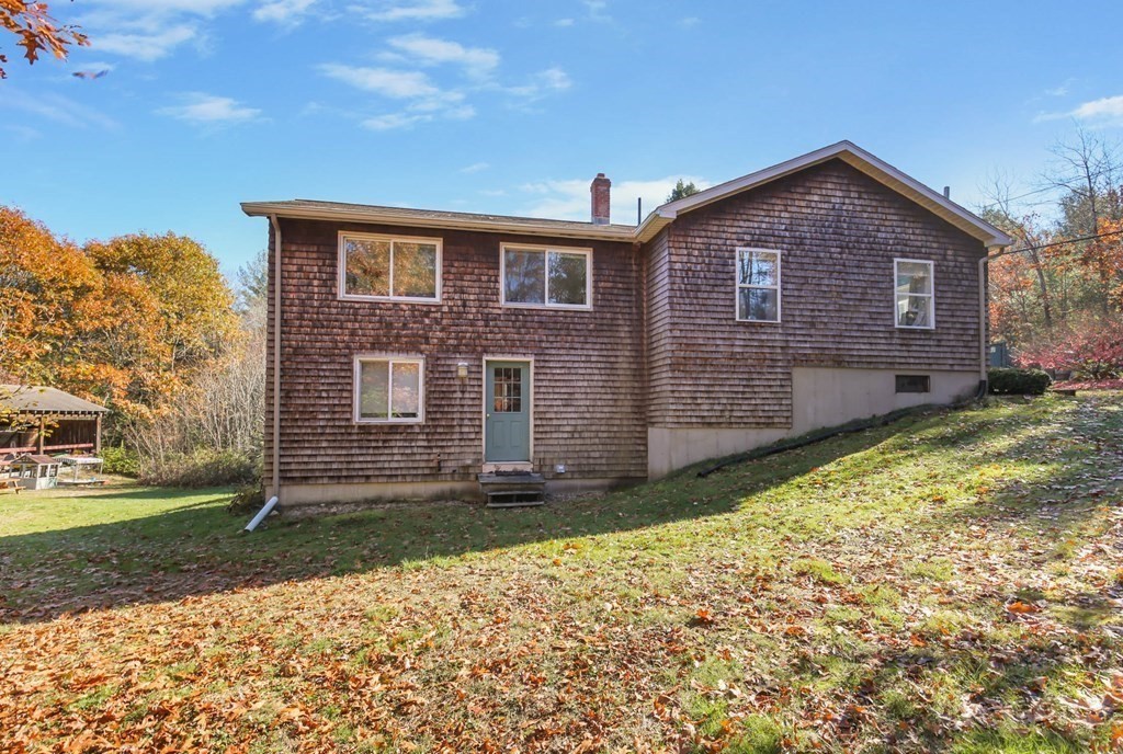 27 Locke Road Rutland, MA 01543 - Photo 26 of 39 a front view of a house with a yard