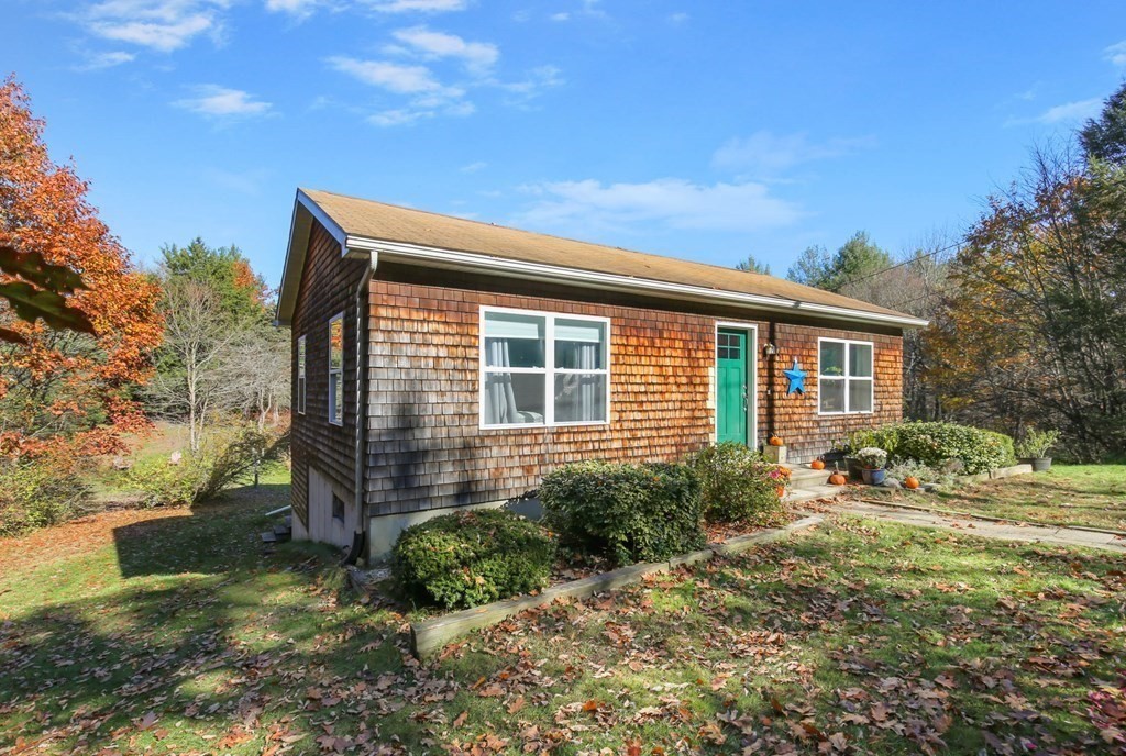 27 Locke Road Rutland, MA 01543 - Photo 37 of 39 a front view of a house with garden