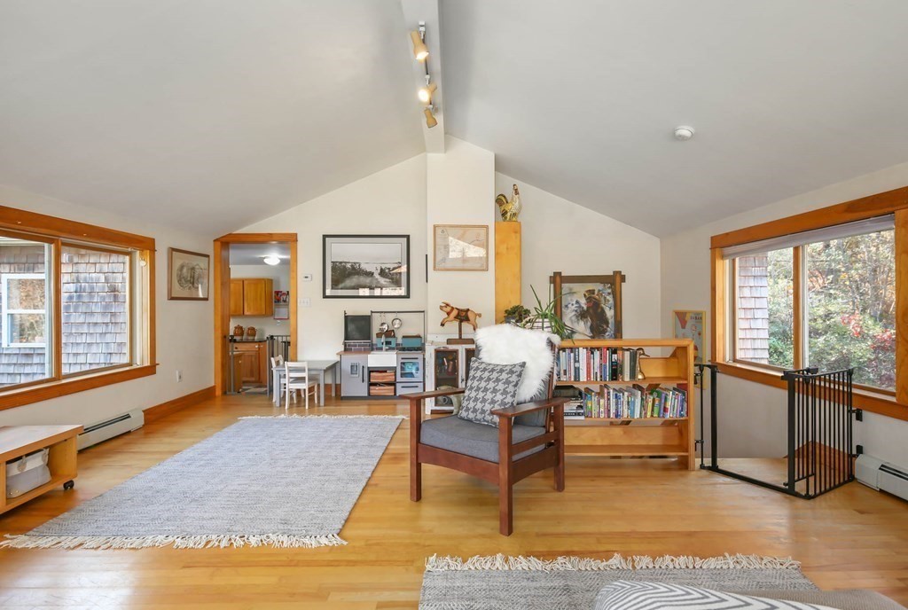 27 Locke Road Rutland, MA 01543 - Photo 7 of 39 a living room with furniture large window and glass door