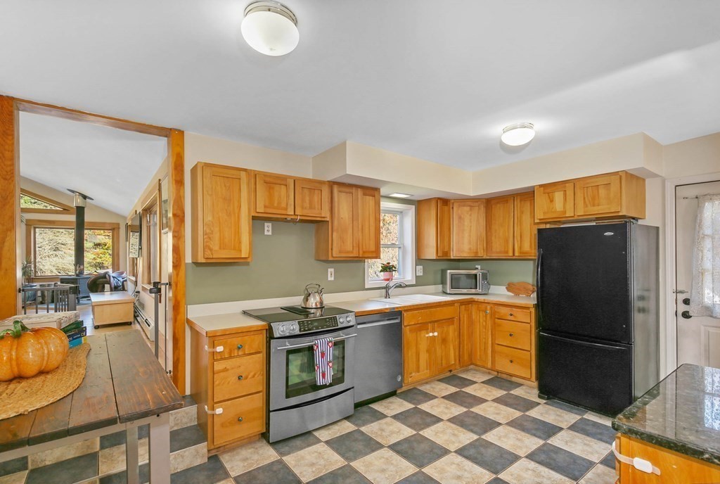 27 Locke Road Rutland, MA 01543 - Photo 8 of 39 a kitchen with a sink appliances and cabinets