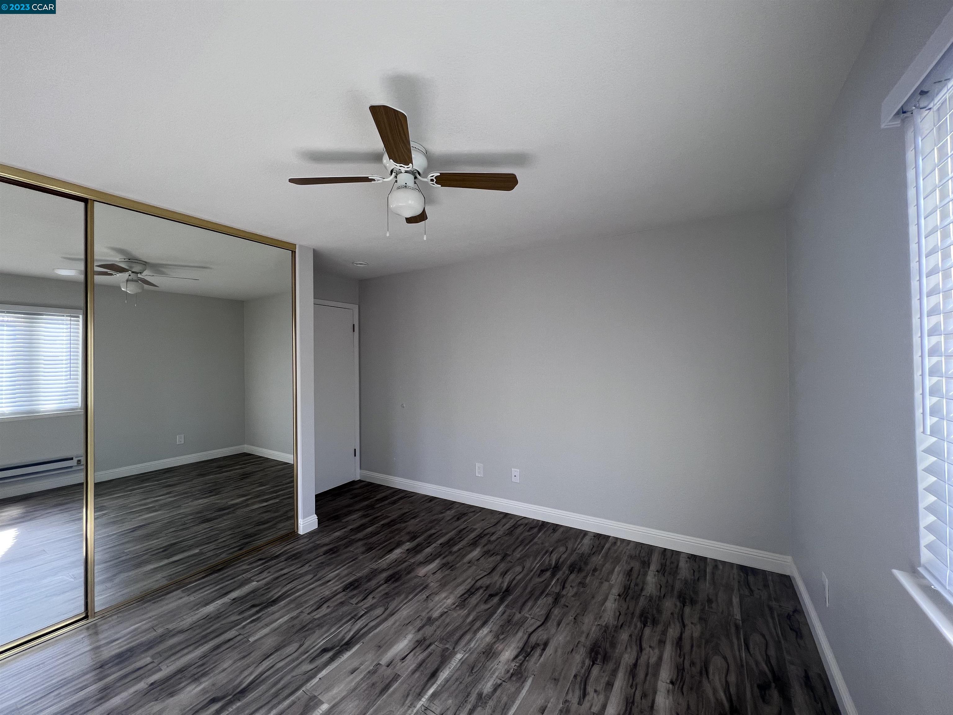 1505 Kirker Pass Road, Unit 239 Concord, CA 94521 - Photo 14 of 22 wooden floor in an empty room