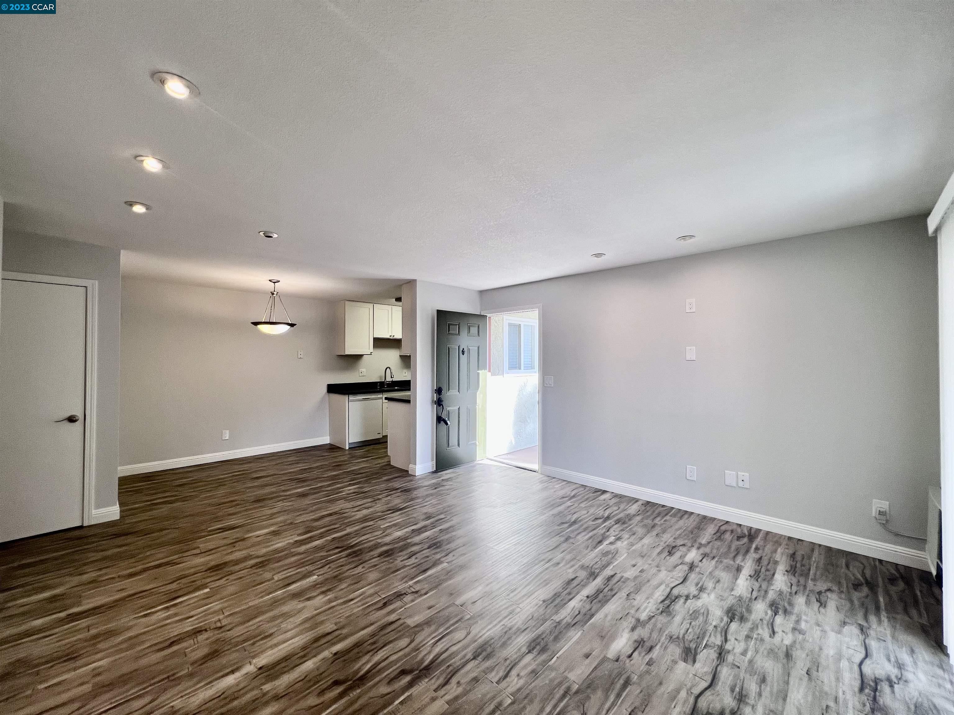 1505 Kirker Pass Road, Unit 239 Concord, CA 94521 - Photo 4 of 22 a view of empty room with wooden floor