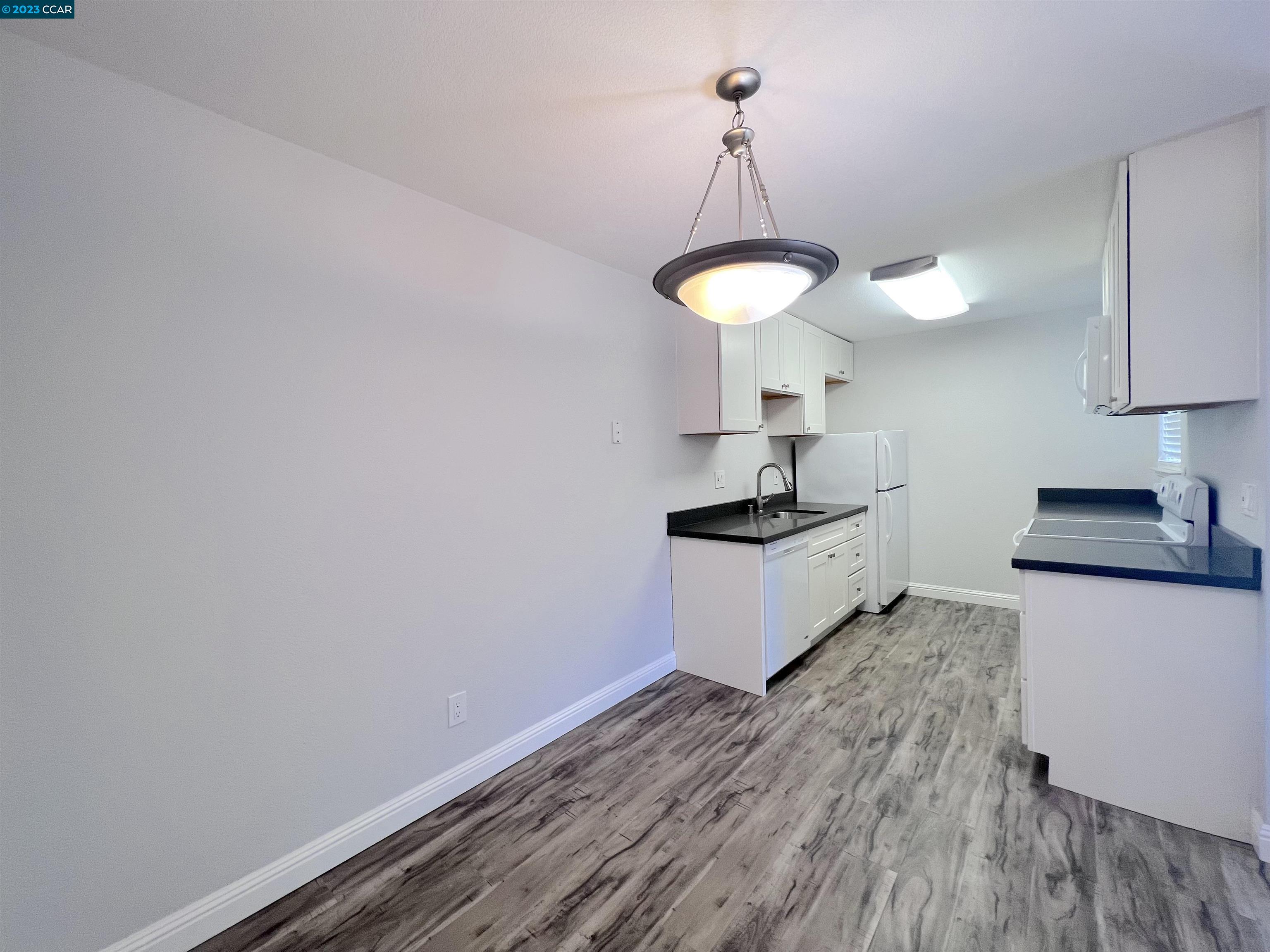 1505 Kirker Pass Road, Unit 239 Concord, CA 94521 - Photo 5 of 22 a kitchen with sink and cabinets