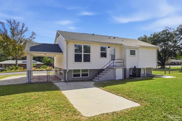 a view of a house with a swimming pool