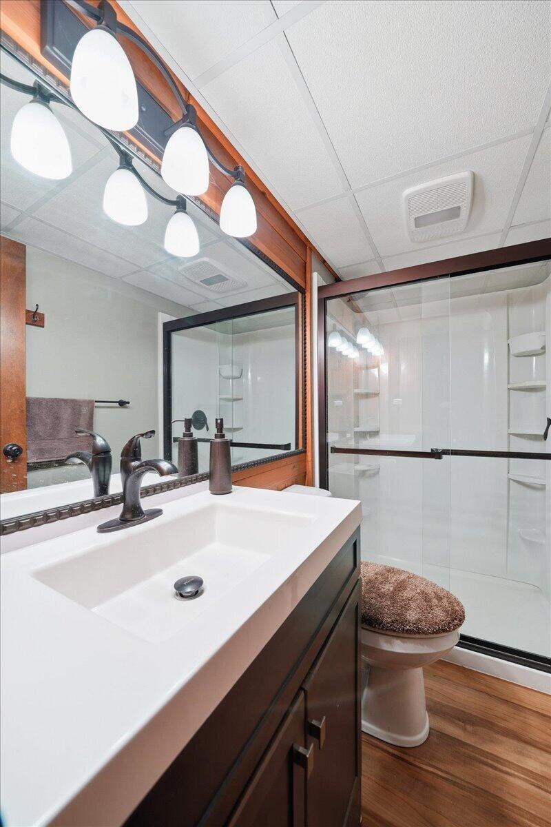 63 Ski Hill Road Portage, IN 46368 - Photo 22 of 28 a bathroom with a sink a toilet and a mirror